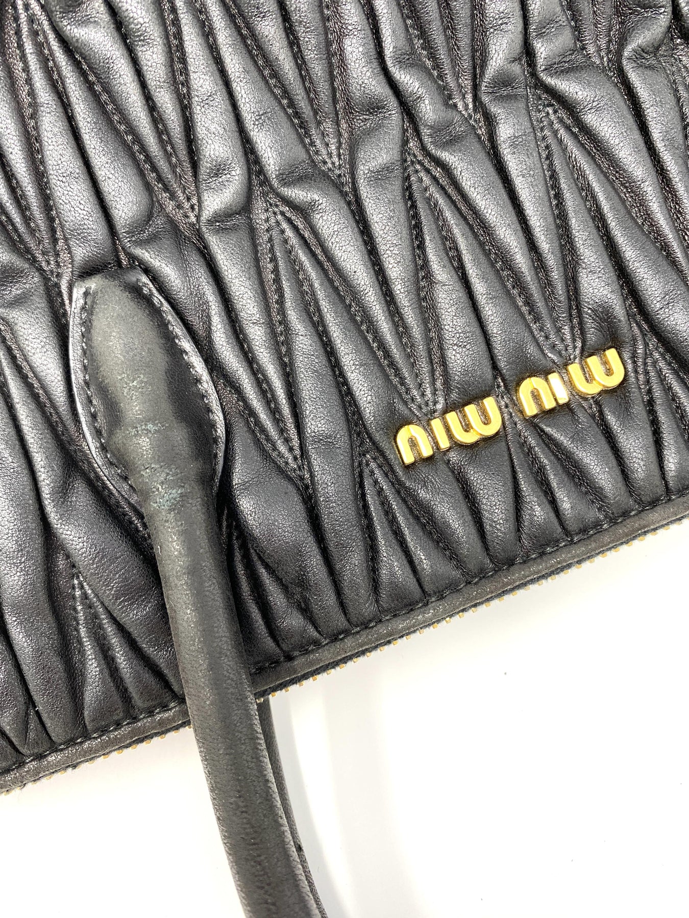 Miu Coffer Matelassé Nappa Leather Handbag In Black